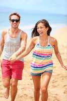 Beach vacation - happy fun romantic couple