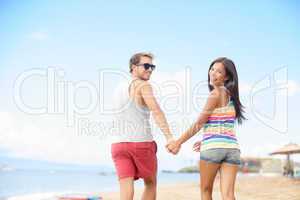 Beach vacation fun with cool trendy hipster couple