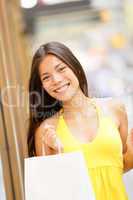 Shopping girl portrait with shopping bags outside