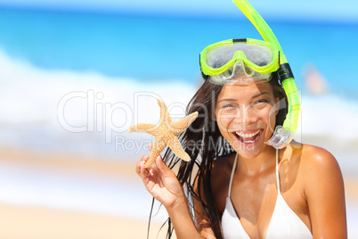 Beach travel woman with snorkel on vacation