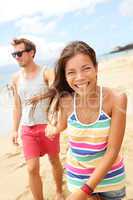 Couple enjoying romantic beach vacation holiday