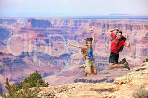 Happy people jumping in Grand Canyon
