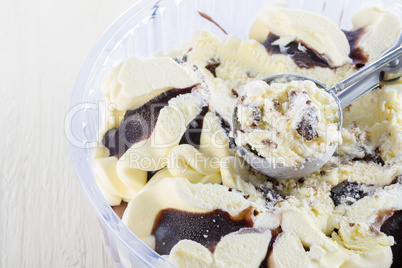 vanilla with chocolate ice cream scoop