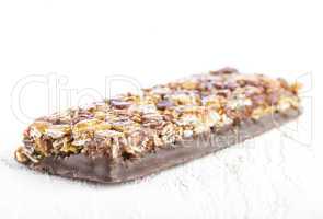 Chocolate Muesli Bars on white wooden table