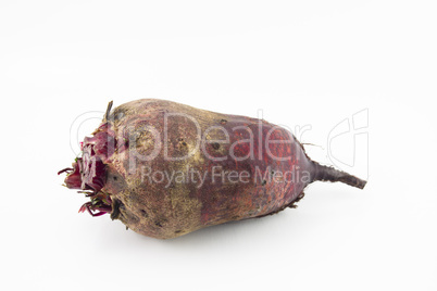 Large rustic beets on a white background