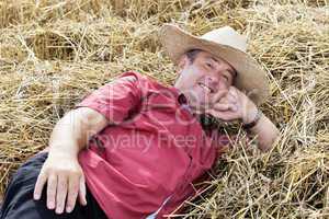 man who is down on straw and takes a rest