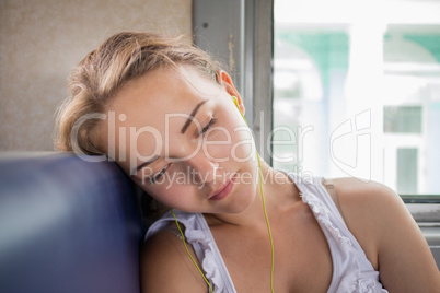 Girl listens to music of  train