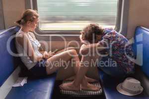 Teenagers boy and girl  in the train