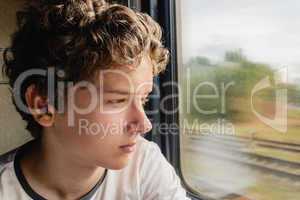 Teenage boy in the train