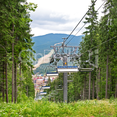 the chair lift in the mountains in summer