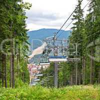 the chair lift in the mountains in summer