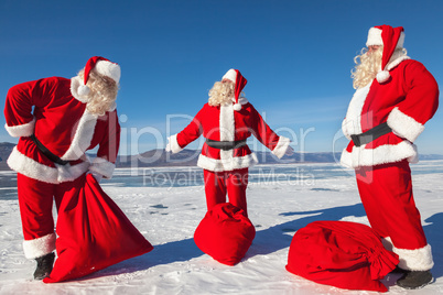 Meeting of three Santa Clauses