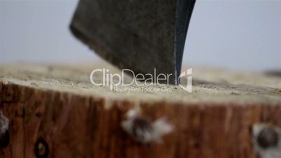The tip on an axe pinch on the wood