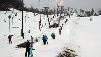 A view of a ski resort with lots of people