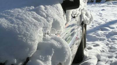 A car covered with snow