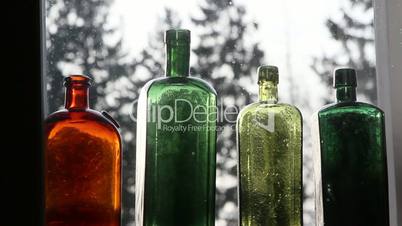 Set of colored wine bottles
