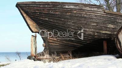 An old wrecked wooden boat