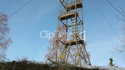 A steel tower on top of a hill
