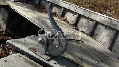 A small anchor inside the boat
