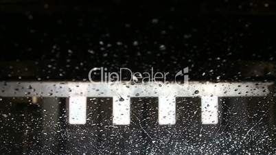 Many carwash car wash raindrops falling on the glass