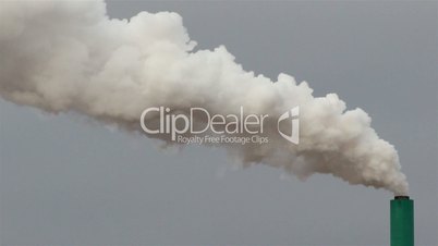 A white smoke coming out from a factory