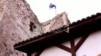 A tower of the castle with a flag