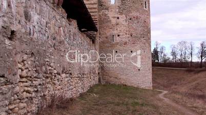 The stone wall of the castle tower
