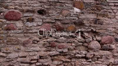 The wall of the castle made of stones