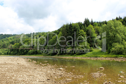 beautiful speed mountainous river in Carpathian mountains