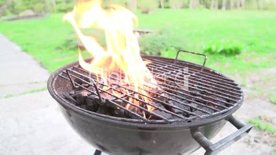 The slow motion of the fire on a grill