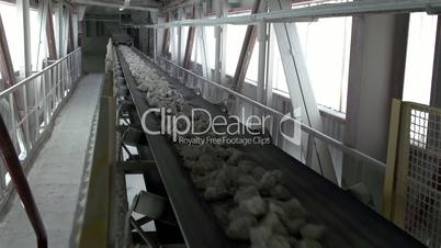 Big limestones transported in a conveyor