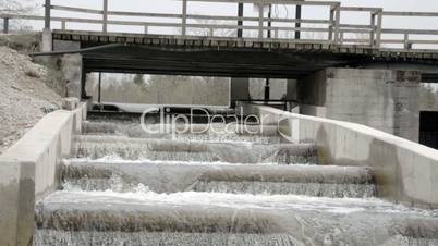 Slow motion of water on a fish ladder