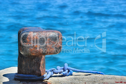 Old rusty bollard