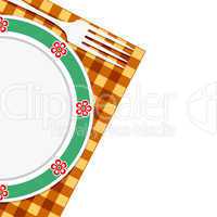 Plate and fork on a napkin