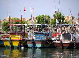 Fisher boats at the beach in the morning light