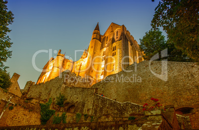 The Mont Saint Michel Abbey at dusk in Lower Normandy, France