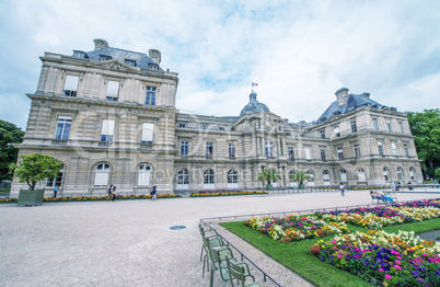 Flowers and buildings of Luxembourg Gardens in Paris