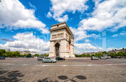 Arc de Triomphe in Paris. Etoile roundabout on a beautiful summe