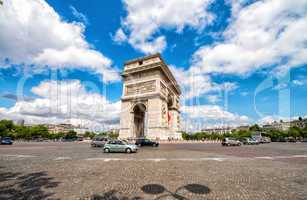 Arc de Triomphe in Paris. Etoile roundabout on a beautiful summe