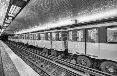 PARIS - JUNE 22, 2014: Underground train in metro station. More