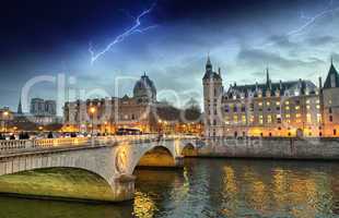 Beautiful colors of Napoleon Bridge with storm with Seine river