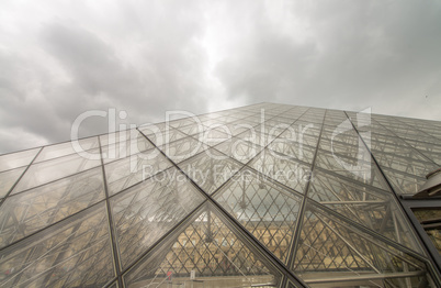 PARIS, FRANCE - JUNE 22, 2014: Pyramid of Louvre geometric lines