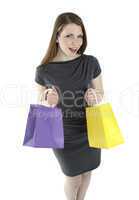 Excited shopping woman shouting with shopping bags