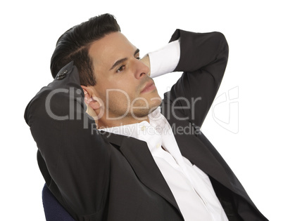 Businessman sitting in chair relaxing
