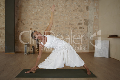 Yoga excercise indoor in a room