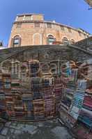 VENICE, ITALY - MAR 22, 2014: Old books of Acqua Alta bookstore.