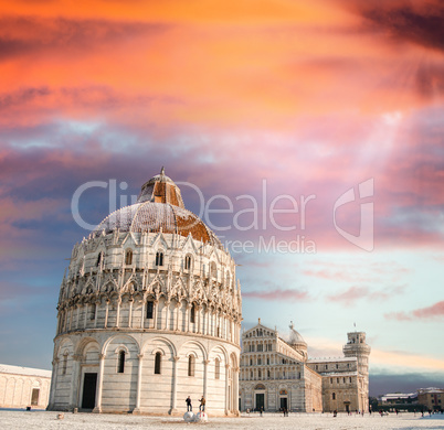 Sunset sky over Pisa Baptistery - Miracles Square in winter