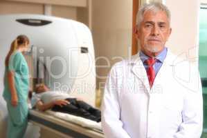 Worried expert senior male doctor awaiting his patient to underg