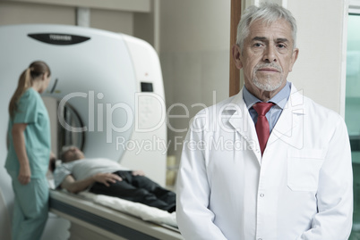 Worried expert senior male doctor awaiting his patient to underg