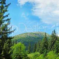 scenic mountain peaks against the blue sky